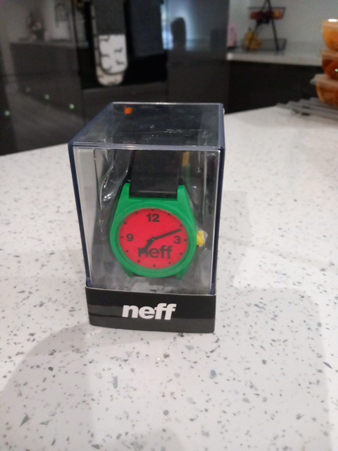 Neff Watch Black Rubber Strap. Red face with green surround Working & Boxed