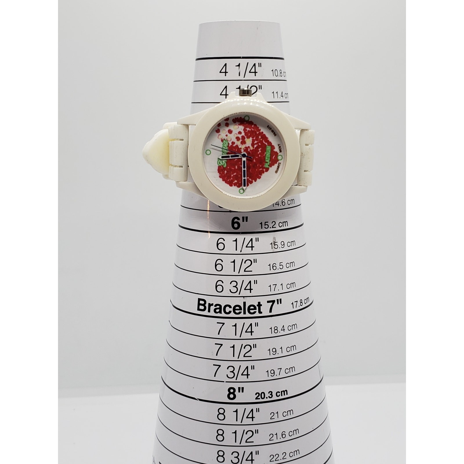 Geneva Platinum women’s watch. Water colored red heart on face. Working watch