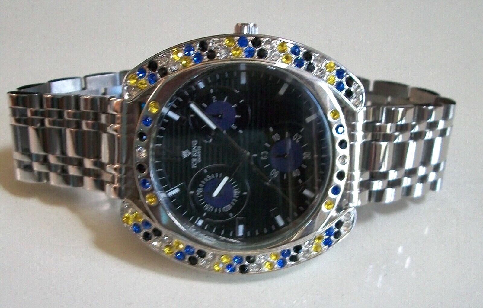 Men’s silver finish clear, blue, black & yellow stone fashion hip hop watch