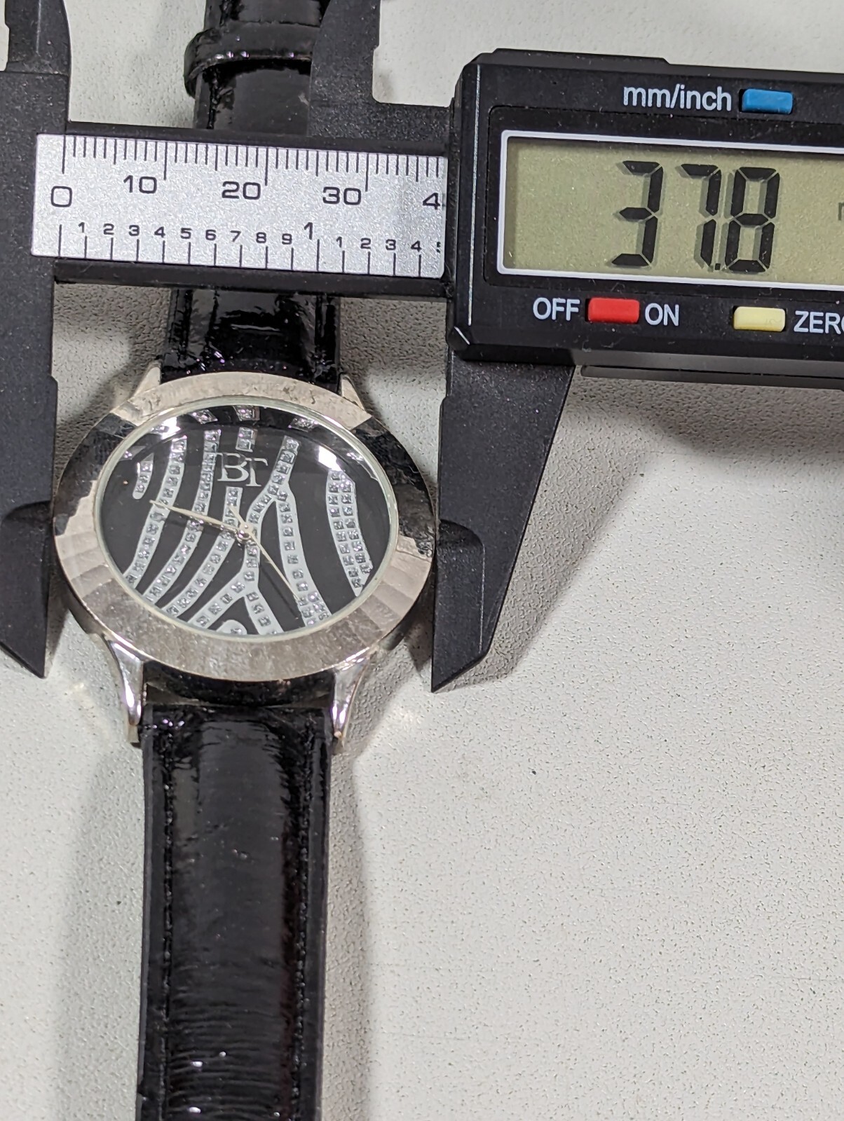 Black Silver Tone Dial Round Case Black Band Watch