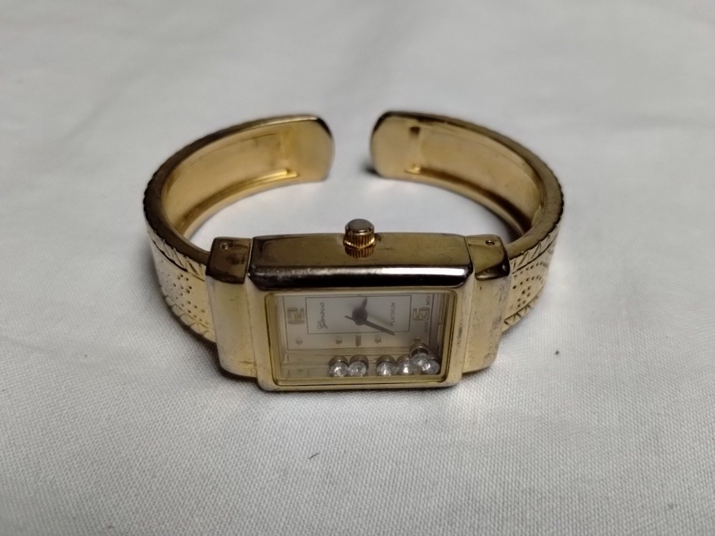 Geneva Analog Wriswatch with a Cuff Band and Quartz Movement With Faux Diamonds