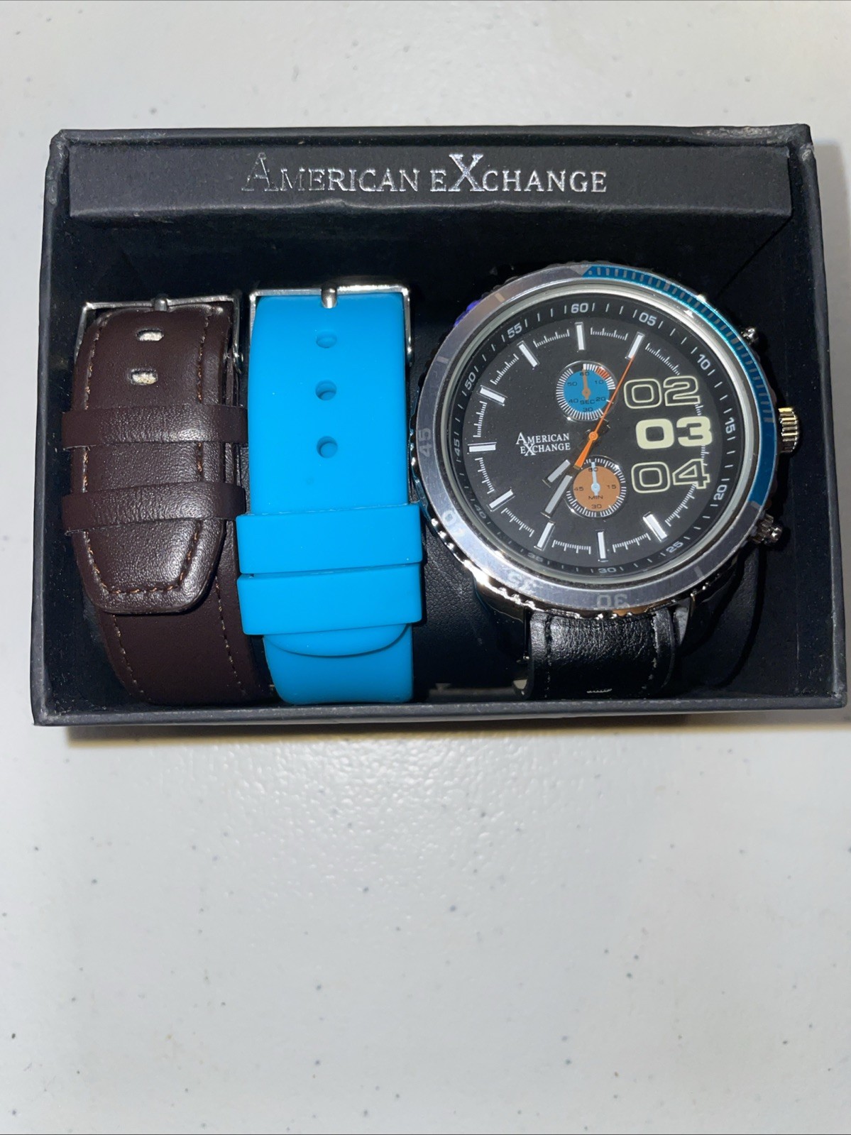 American Exchange Watch in box With 2 Extra Bands, Working condition, See Pics