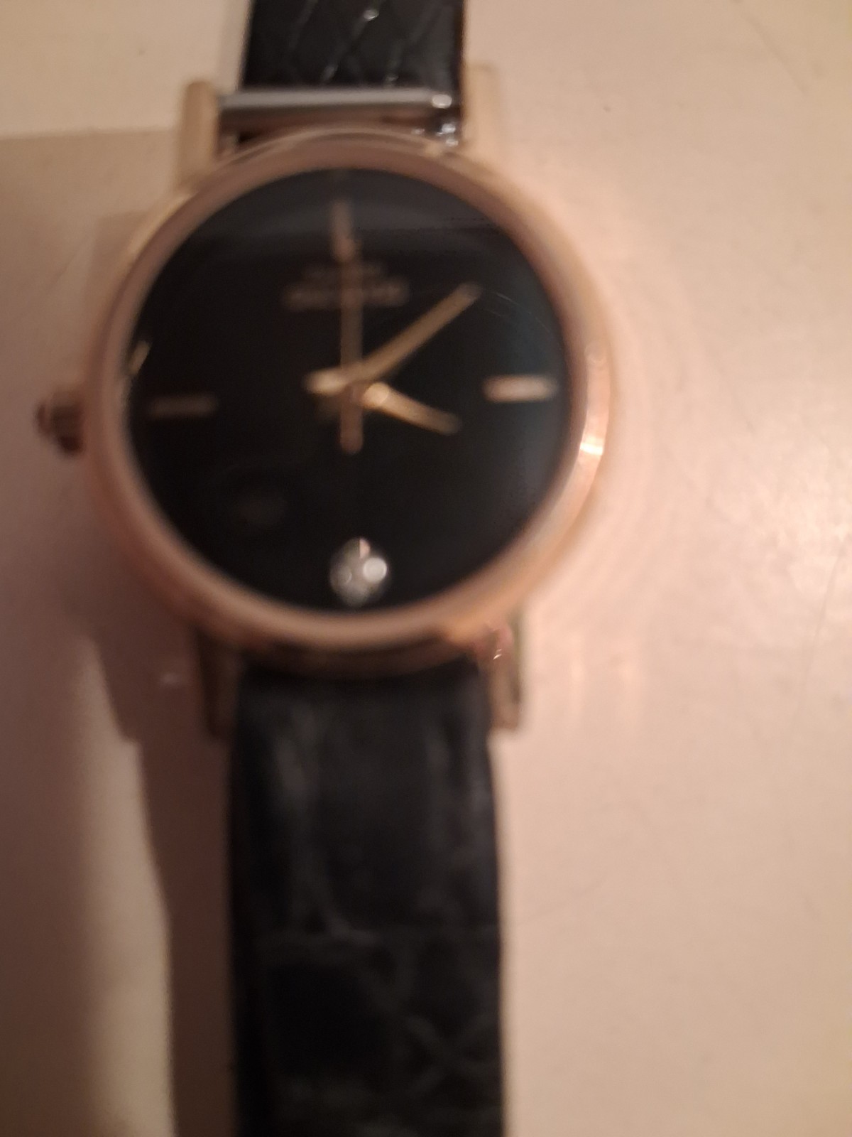 Analog Black Dial Baton Index Gold Tone Metal Case Black Leather Strap Watch