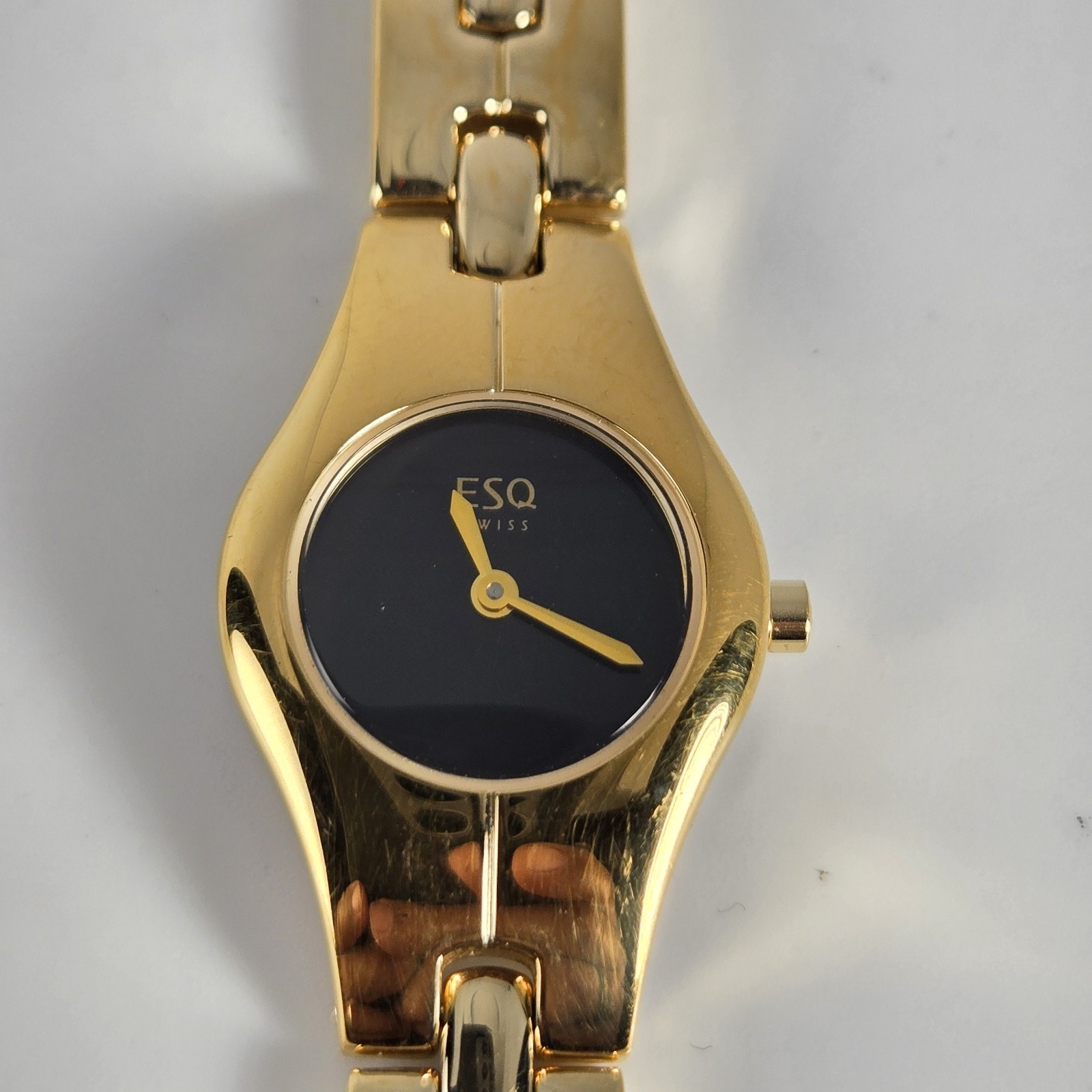 ESQ ESQUIRE SWISS WOMEN’S STAINLESS ST BACK WATER-RESISTANT BLACK DIAL GOLD TONE