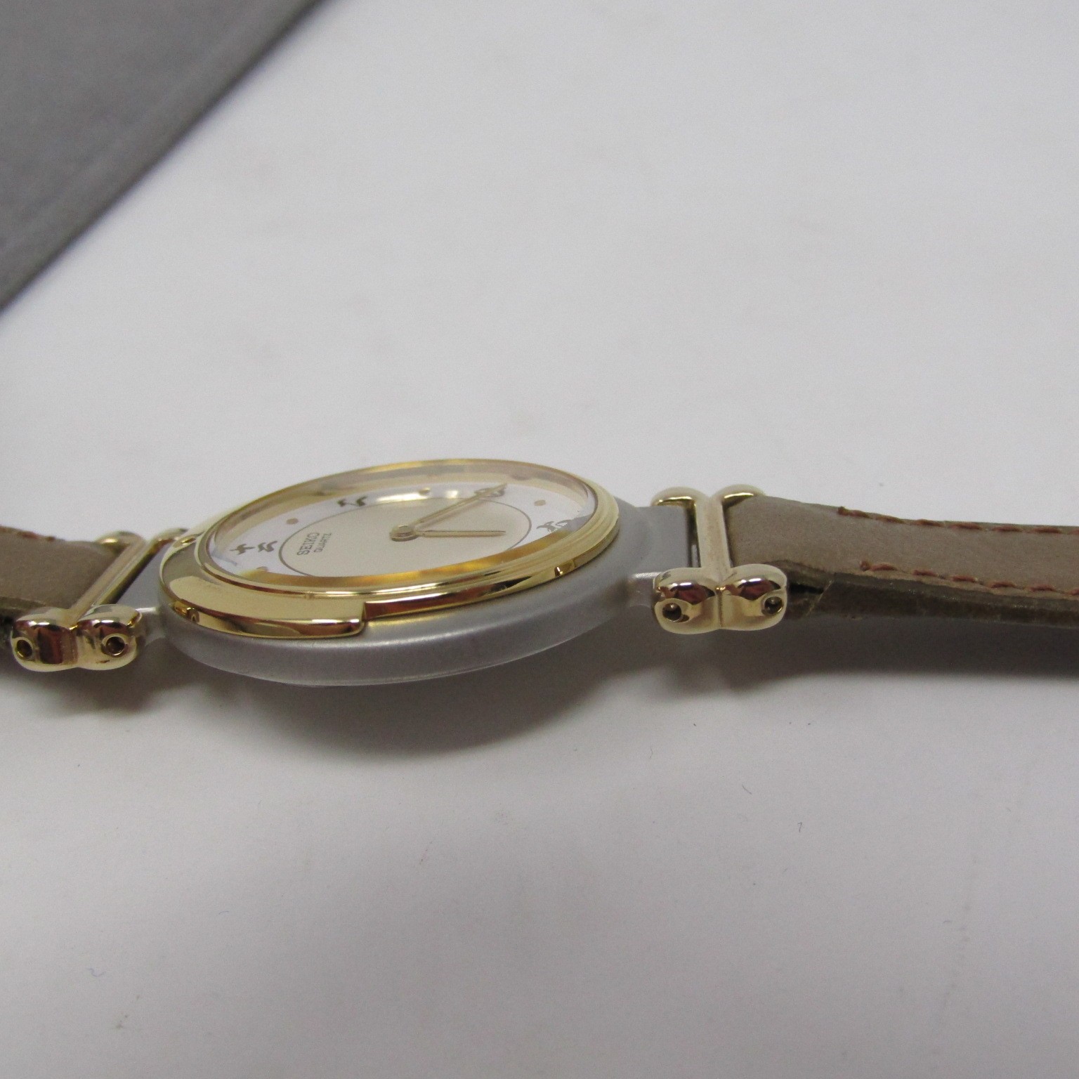 SEIKO Quartz Women’s Watch Gold Tone Bezel Tan Leather Strap 7320-0279 R0 NEW