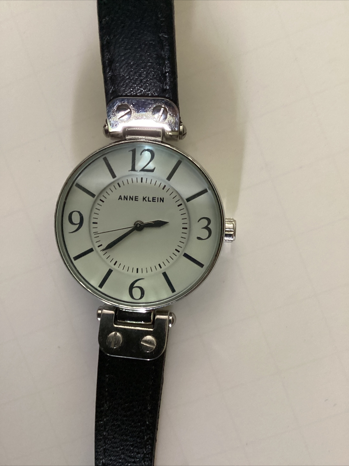 Anne Klein Analog Wriswatch with Water Resistance and a Buckle Band
