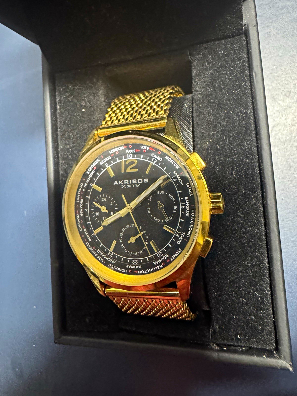 Akribos XXIV Quartz Black Dial Day/Date 24-Hour Gold Mesh 42mm case