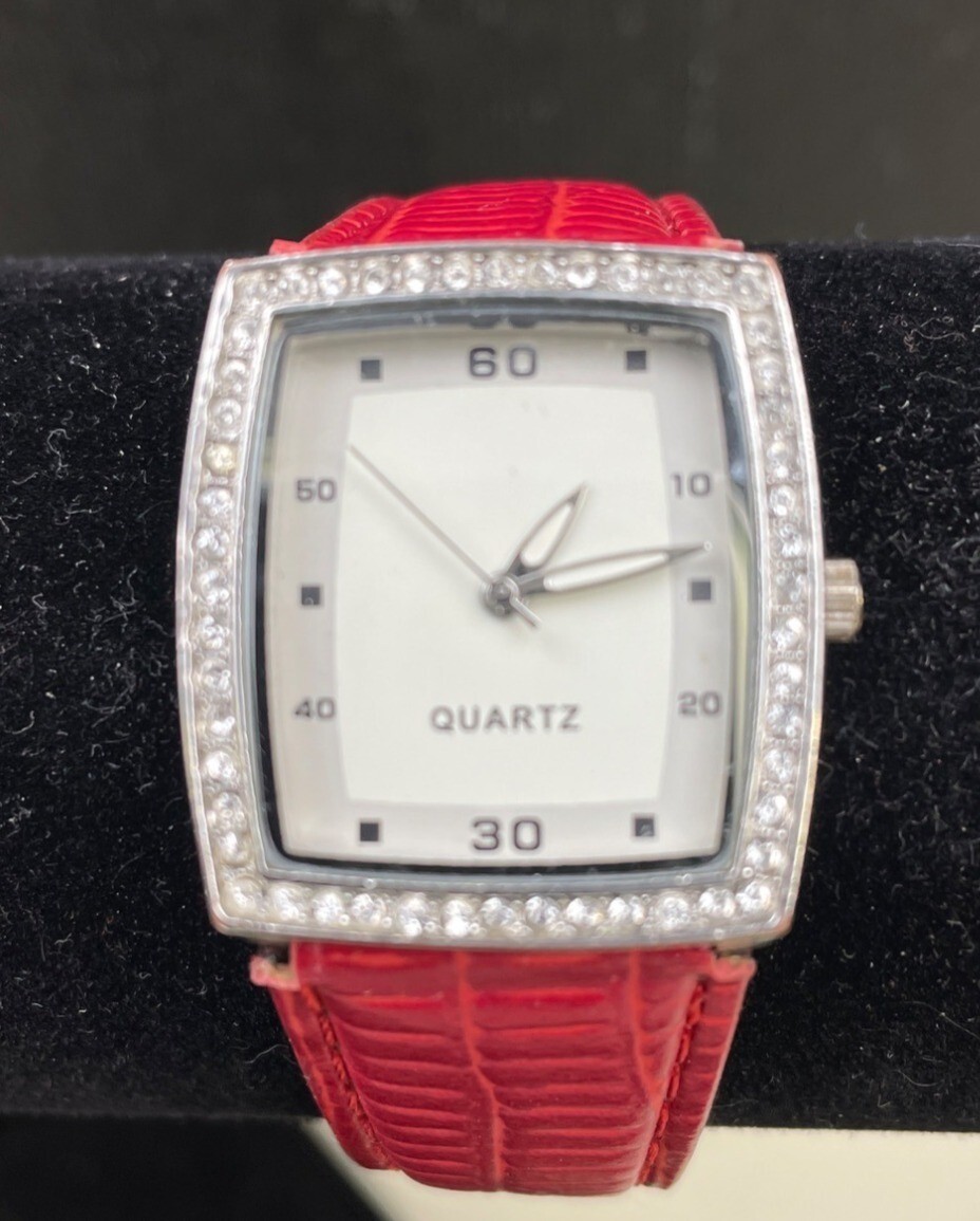 Singapore Movement Women’s Watch Clear stone and Red Band SKU 6138