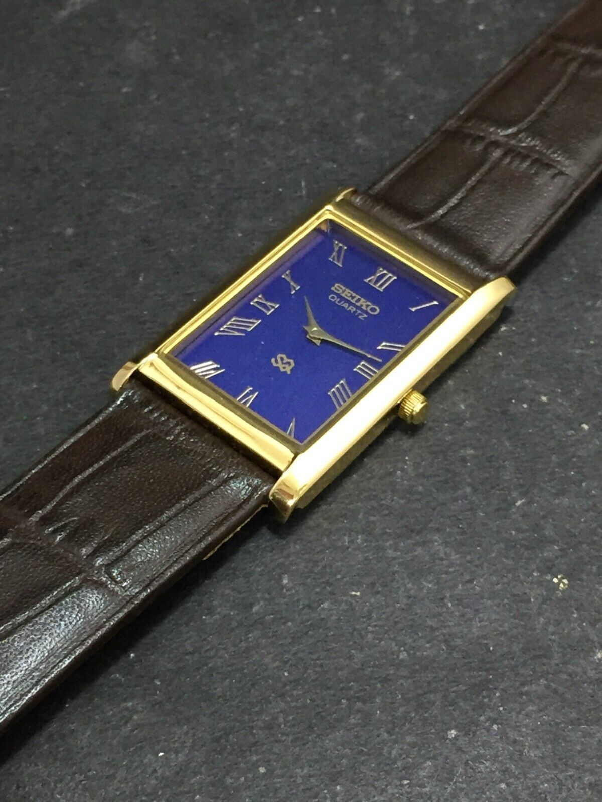 Vintage Seiko Slim Quartz Blue Face Rectangle Japanese 26MM Case Mens Watch S05