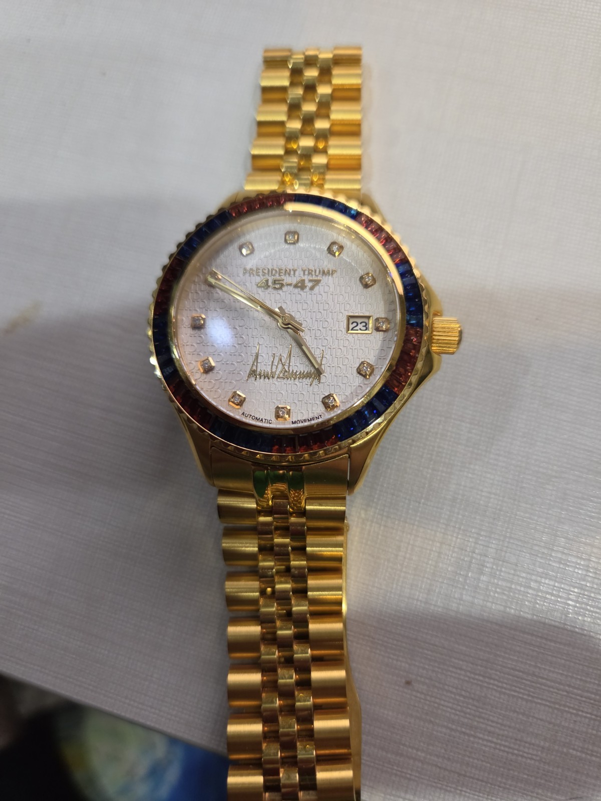 TRUMP Victory 45-47 Men’s 45mm Automatic Date 200m Gold Red/Blue Bezel