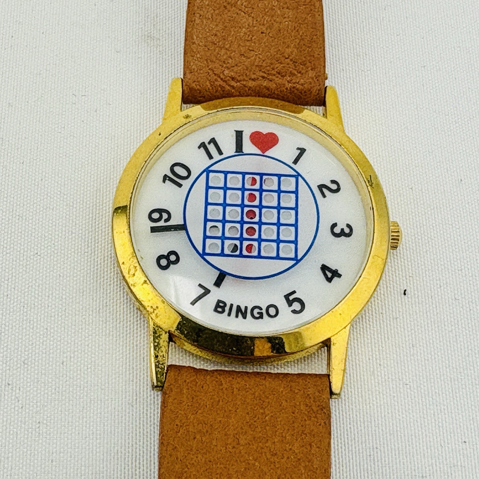 Analog Wriswatch with a Genuine Leather Buckle Band Bingo