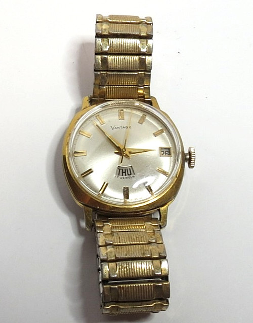 VTG MEN’S VANTAGE BY HAMILTON STANDARD TIME 1i5 DAY/DATE GOLD TONE WRISWATCH