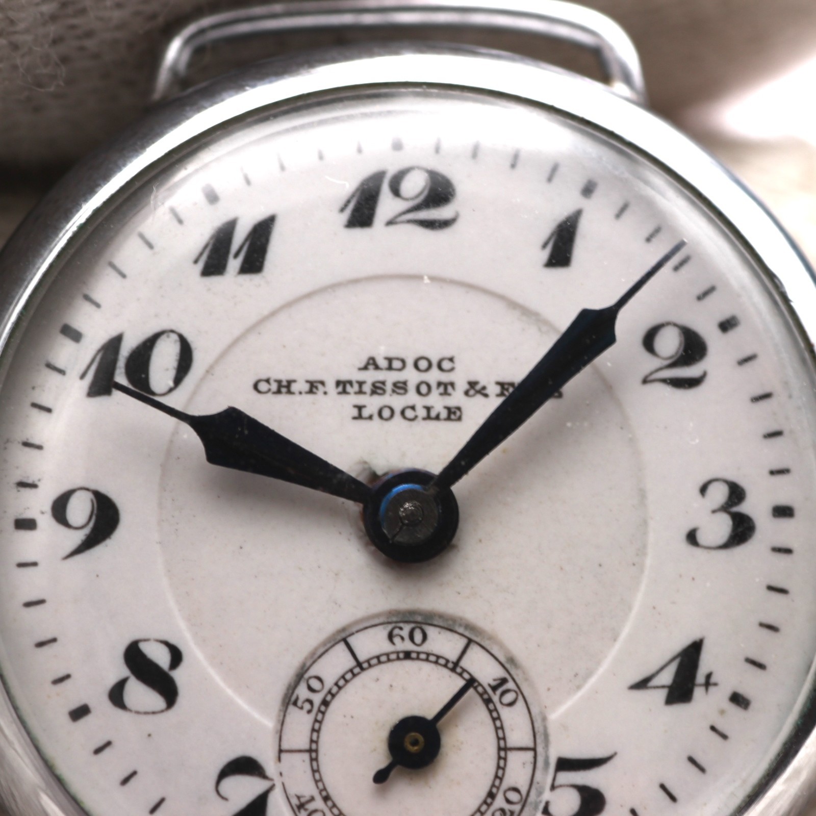 ADOC CH.F.Tissot & Fils Locle Men’s Watch Hand-Wind Blue Hands White Dial 26mm