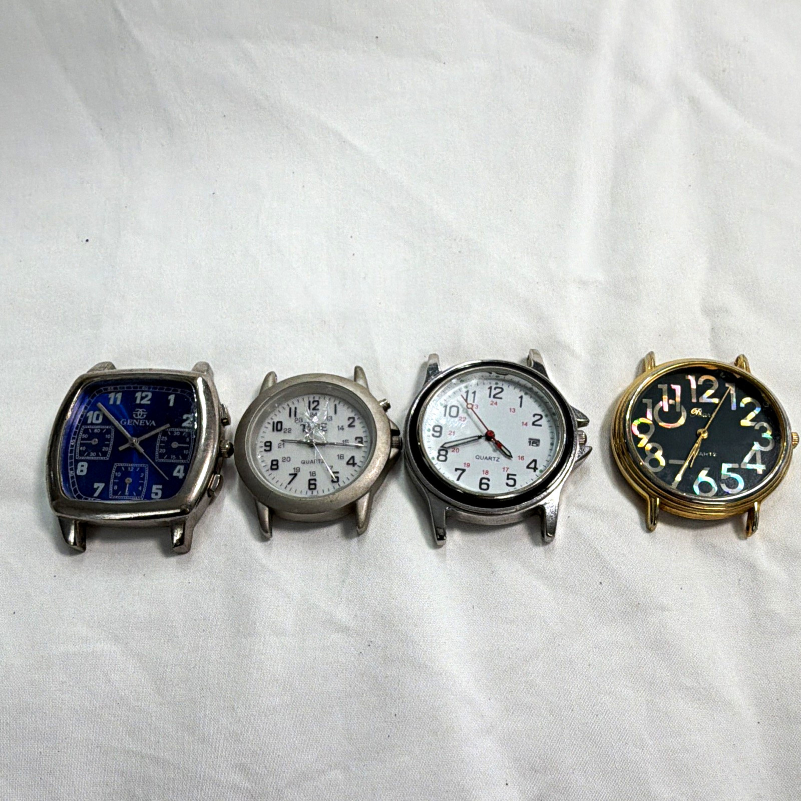 Lot of 4 Quartz Analog Wristwatches Stainless Steel Blue/White/Black Dials Date