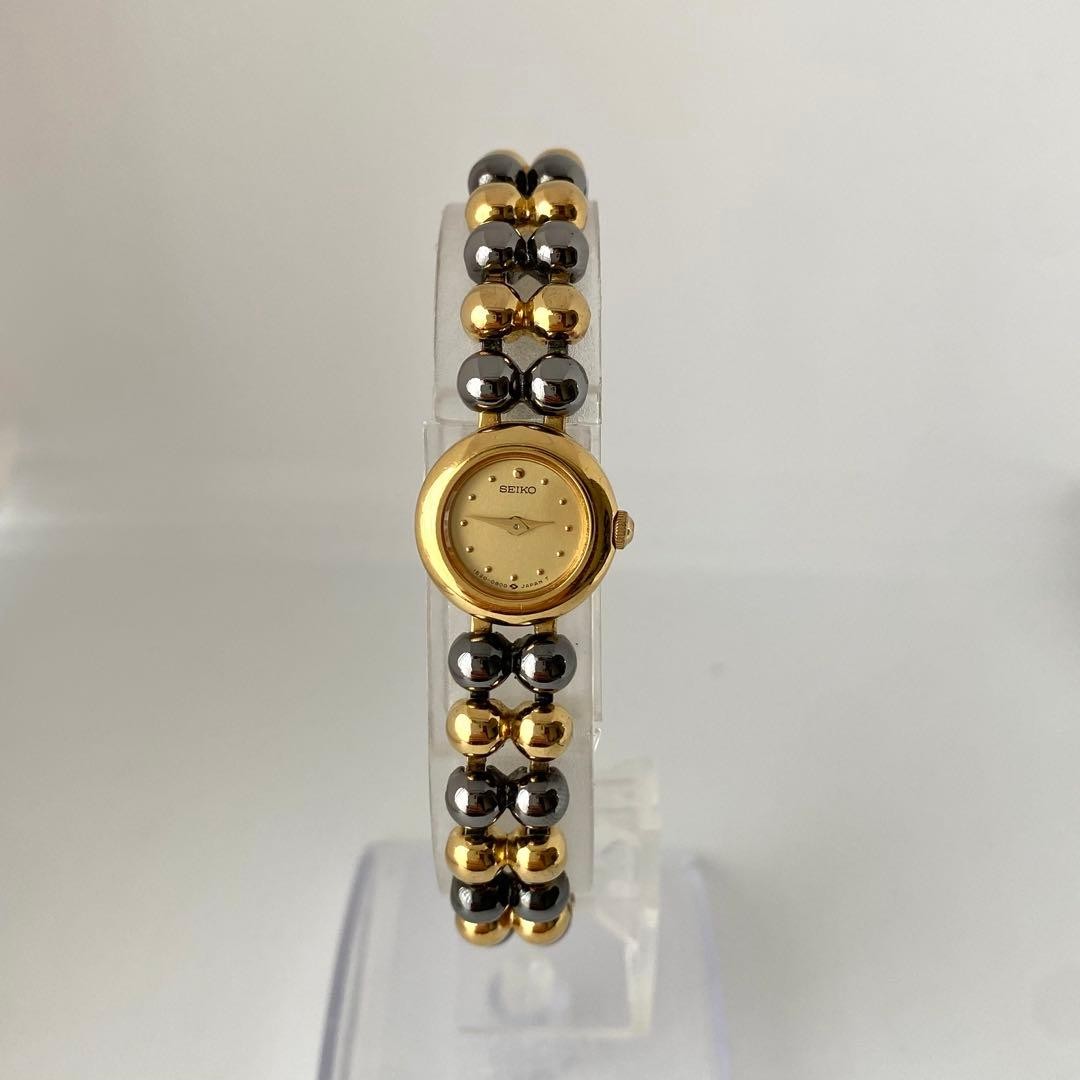 Working SEIKO vintage round black gold elegant