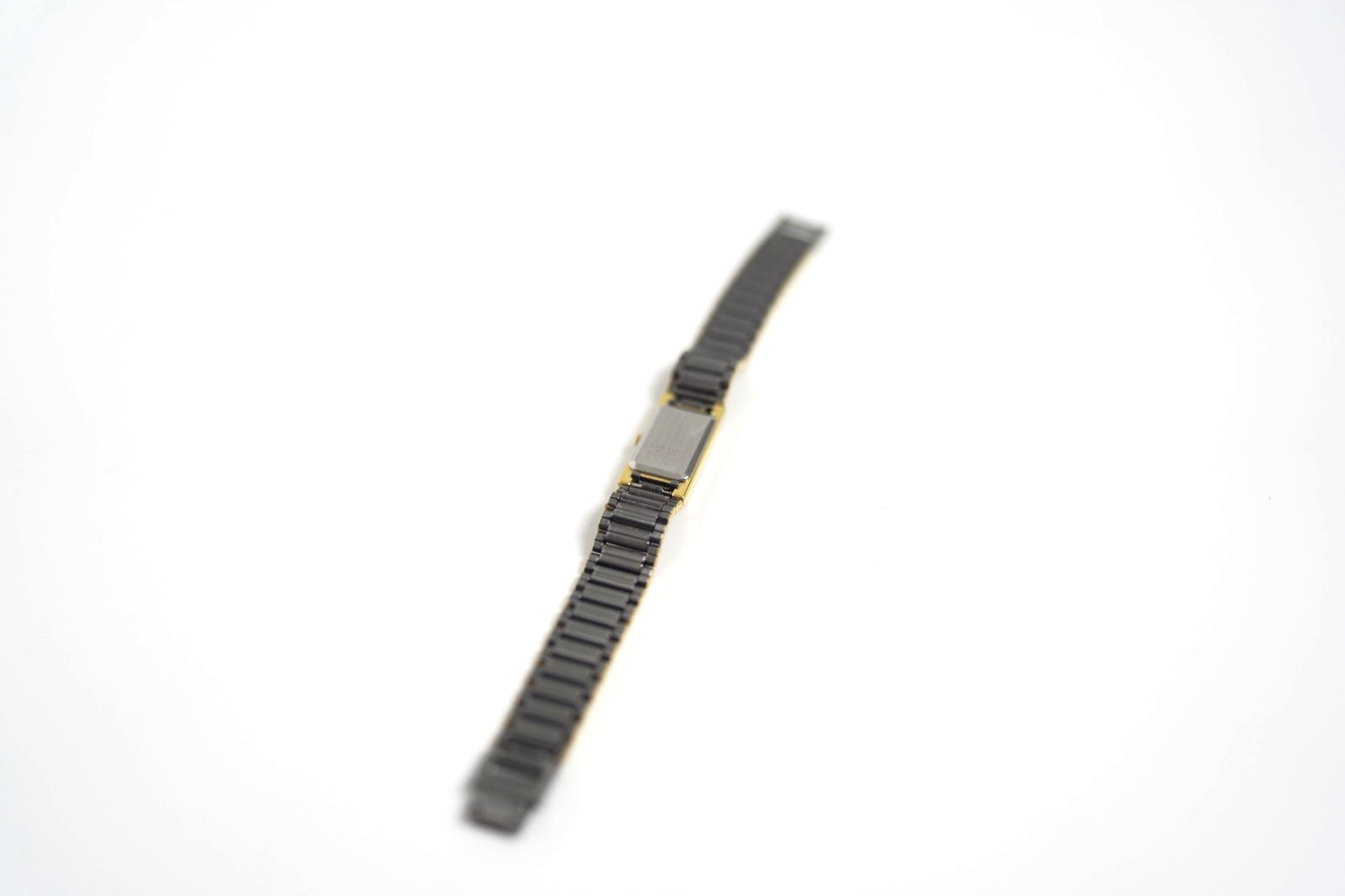 Vintage Seiko Ladies 12mm Quartz Watch Gray & Gold Tone Tank Dial 1E20-551H