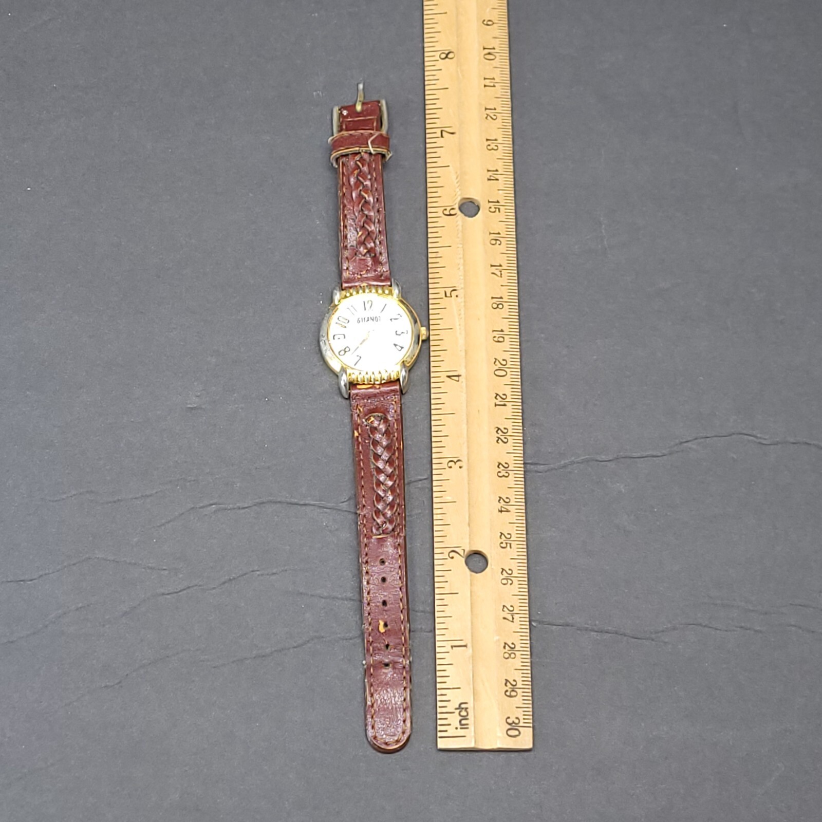 Gitano Analog Wriswatch with a Buckle Band and Quartz Movement