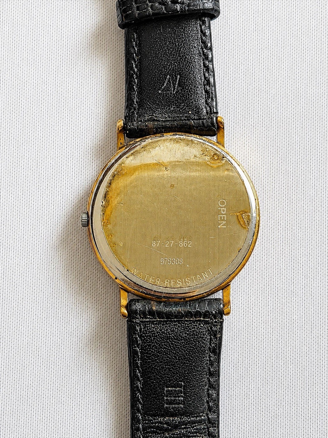 Movado Moon Phases Quartz Moon Phase Day/Date Month Gold Dial Black Leather