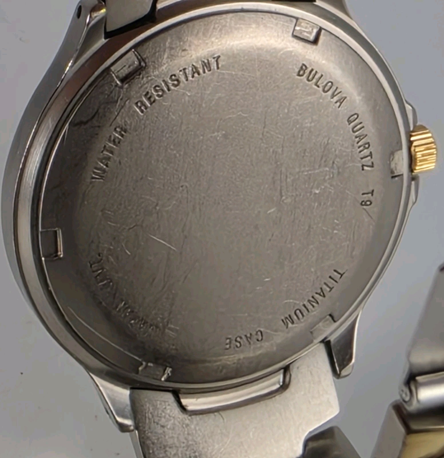 BULOVA SOLAR MILLENNIA TITANIUM SILVER GOLD TONE WATER RESISTAN 35mm GOLD DIAL
