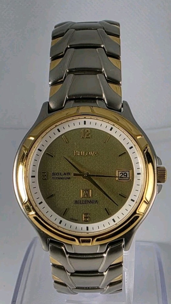 BULOVA SOLAR MILLENNIA TITANIUM SILVER GOLD TONE WATER RESISTAN 35mm GOLD DIAL