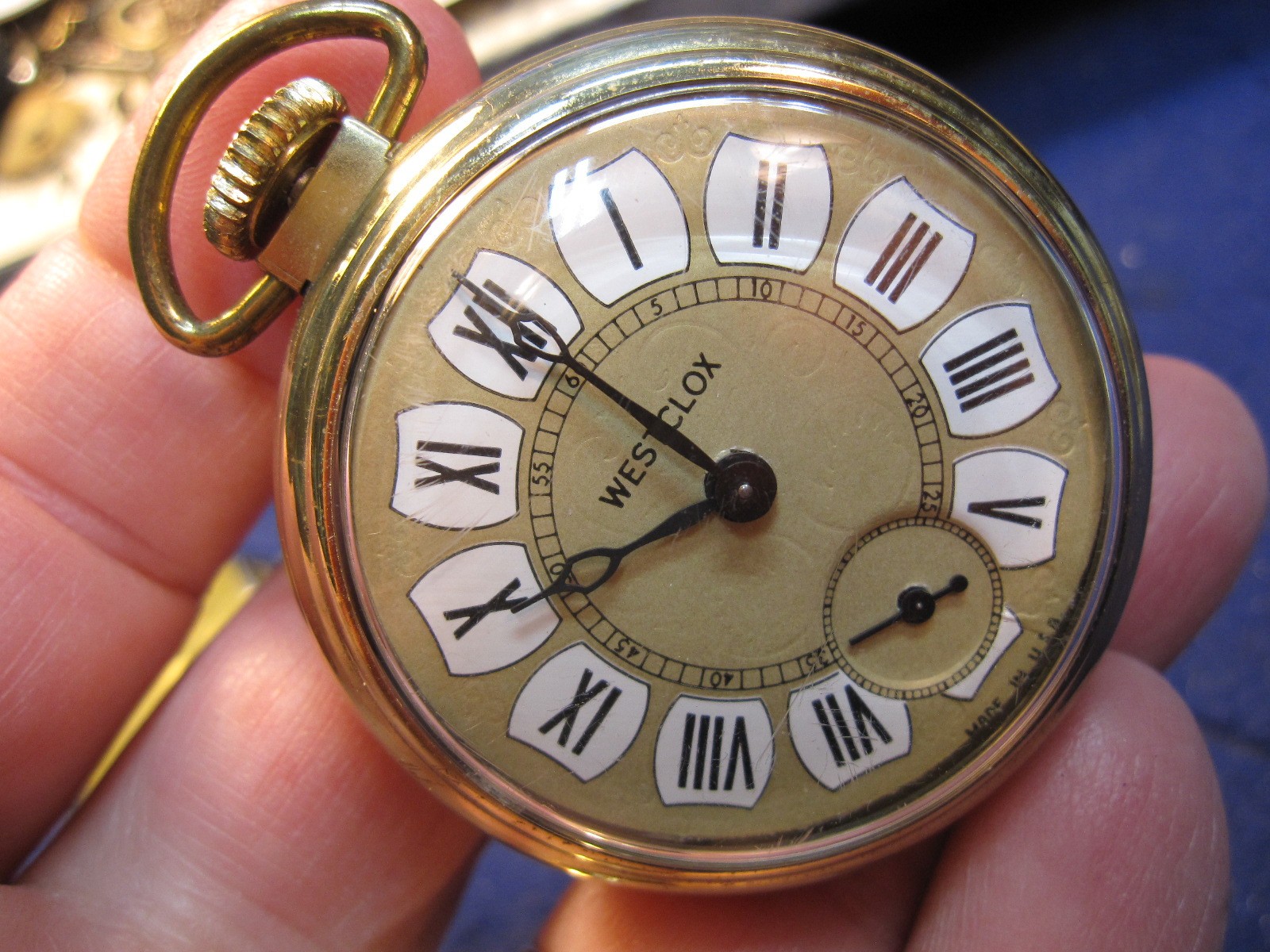 1960’s polished brass dollar watch pocket watch ticks a bit