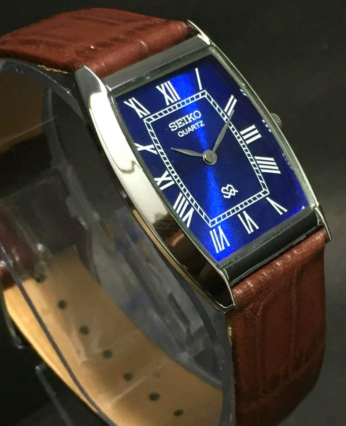 Vintage Seiko Slim Quartz Blue Face Japanese Curve Silver 30MM Mens Watch S15