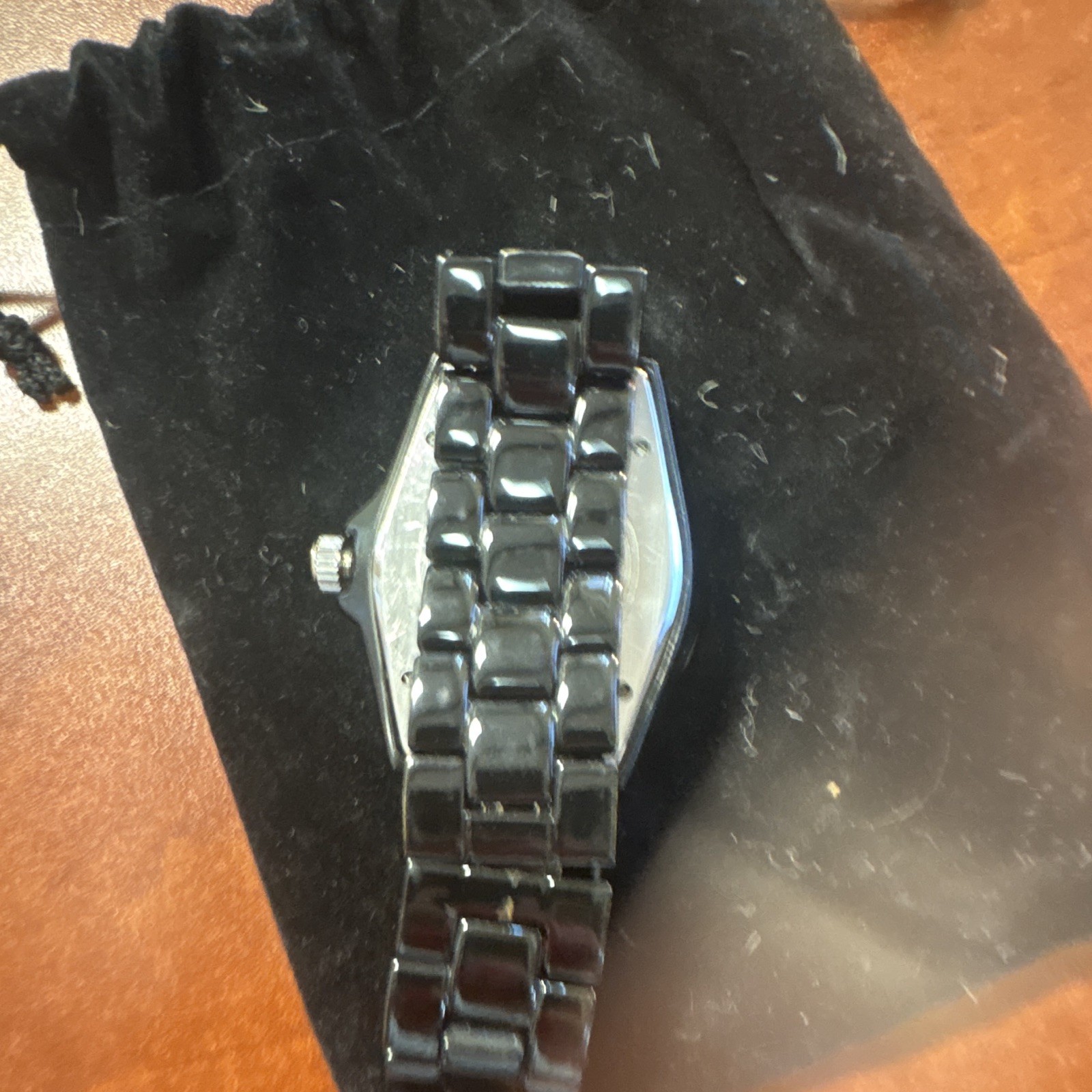 Chanel J12 watch in black ceramic with a diamond-set bezel