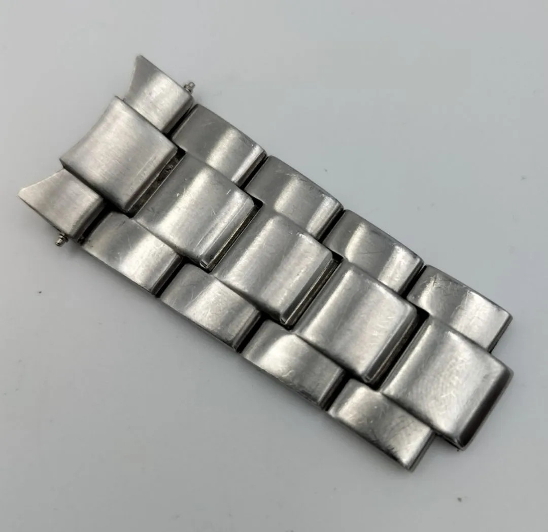 Used watch parts: Citizen Alterna H500-S064538 end piece, flash fit, strap band.