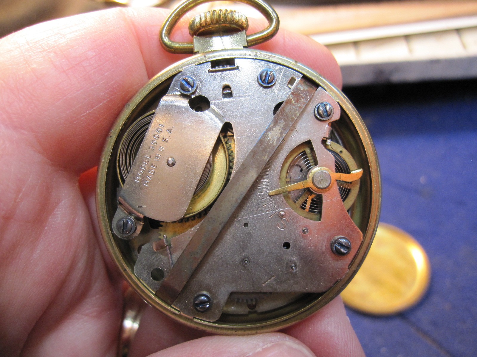 1960’s polished brass dollar watch pocket watch ticks a bit