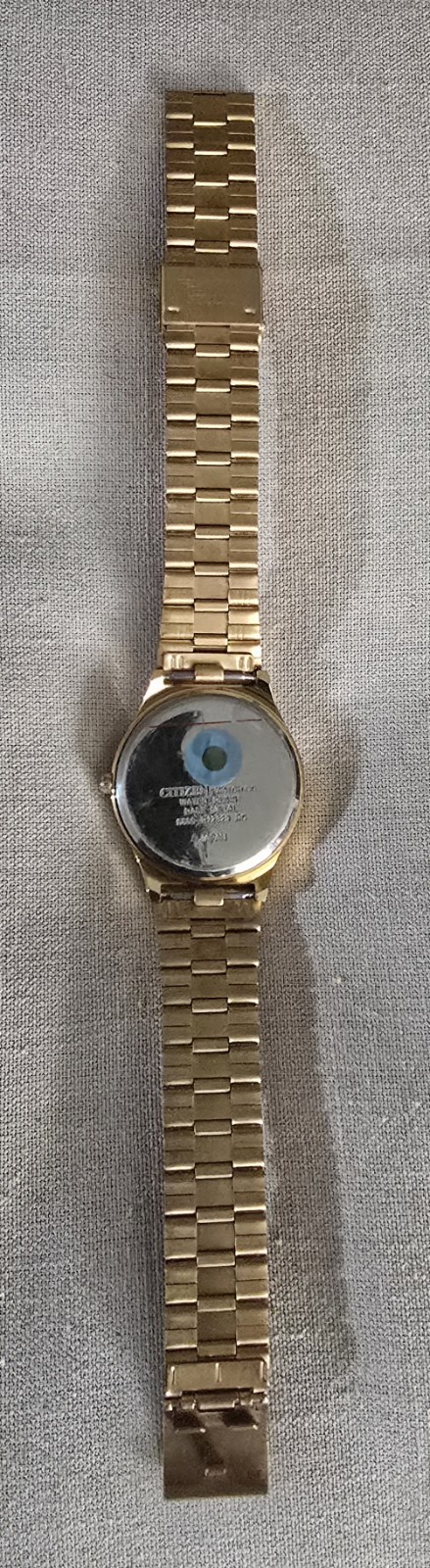 Citizen Champagne Dial Gold-Tone/Stone Bezel Arabic/English Day-Date