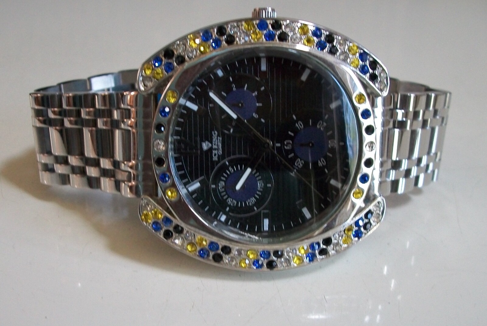 Men’s silver finish clear, blue, black & yellow stone fashion hip hop watch