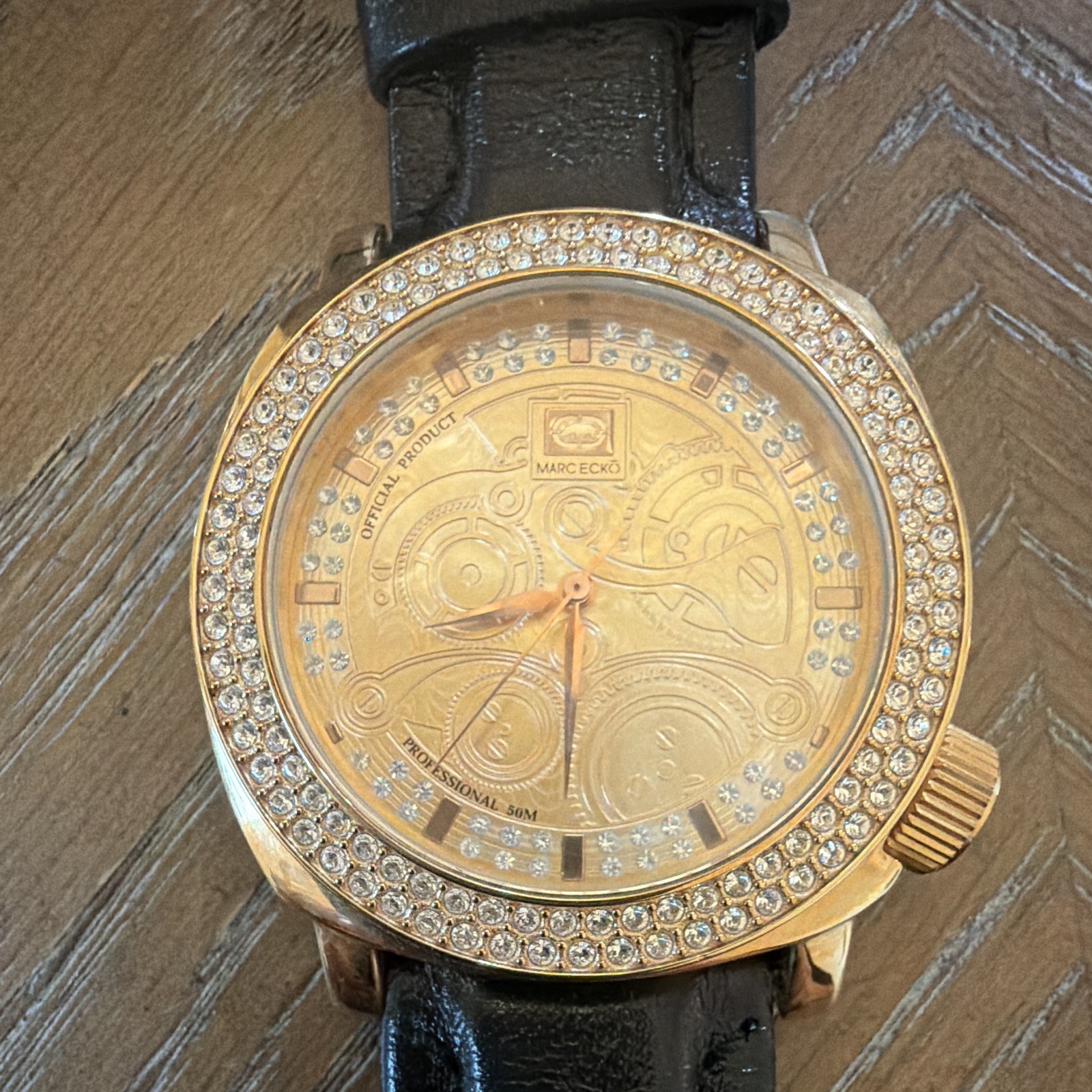 Marc Ecko E10525G1 Quartz Analog Watch Gold Dial Black Leather Strap 52mm 50m