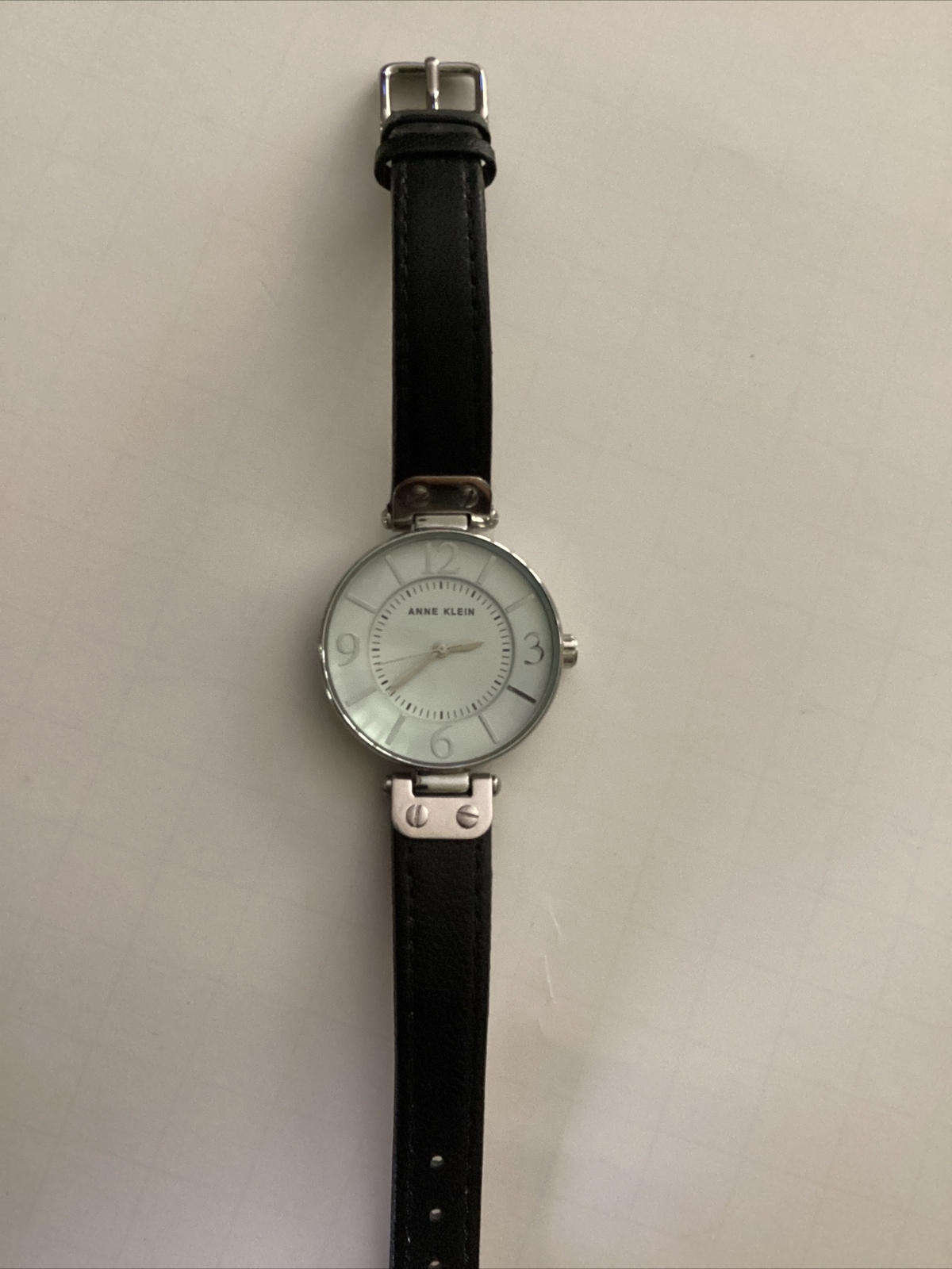 Anne Klein Analog Wriswatch with Water Resistance and a Buckle Band