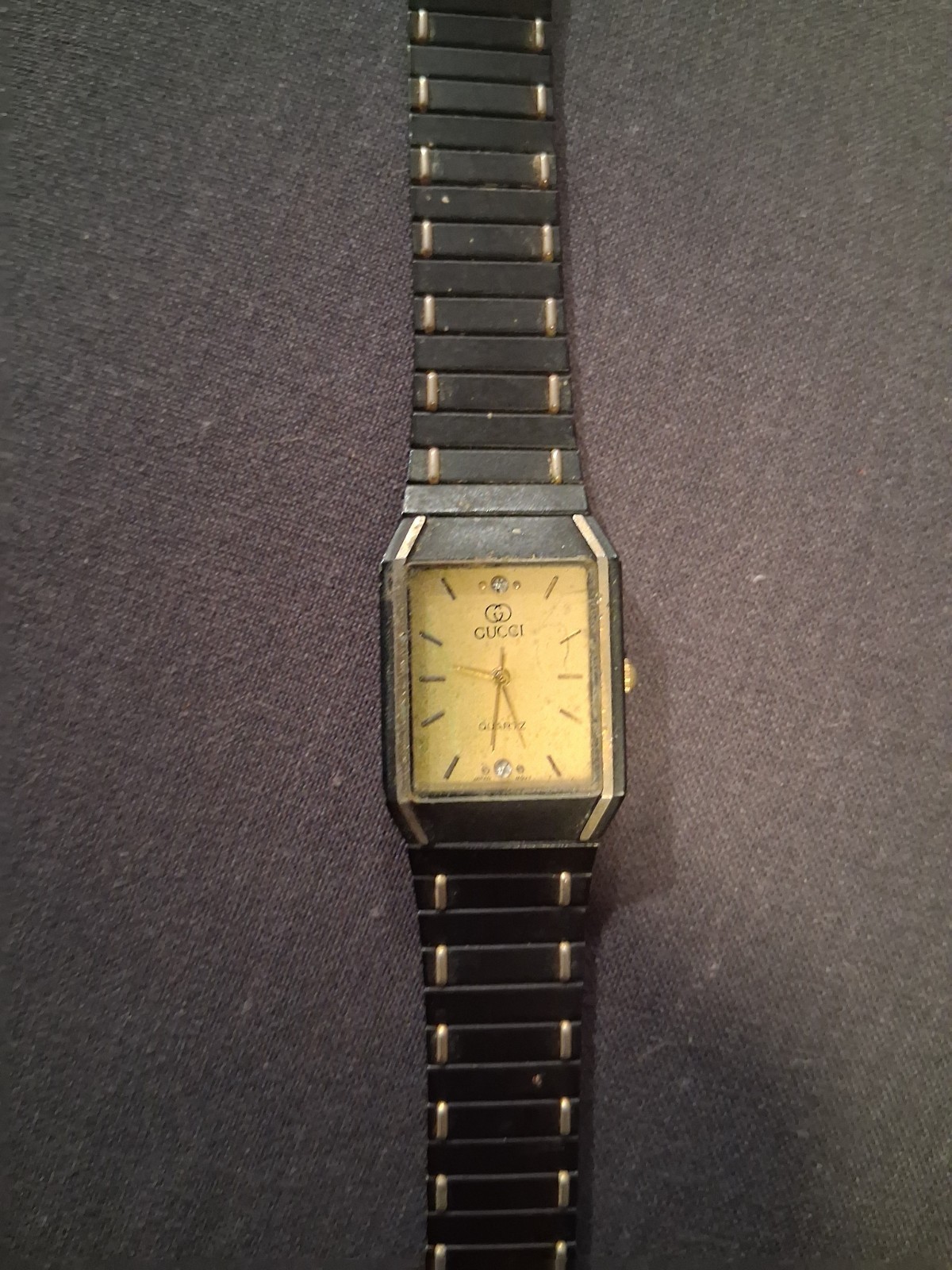 Gucci Quartz Rectangular Analog Watch Gold Dial Black/Silver Steel Bracelet