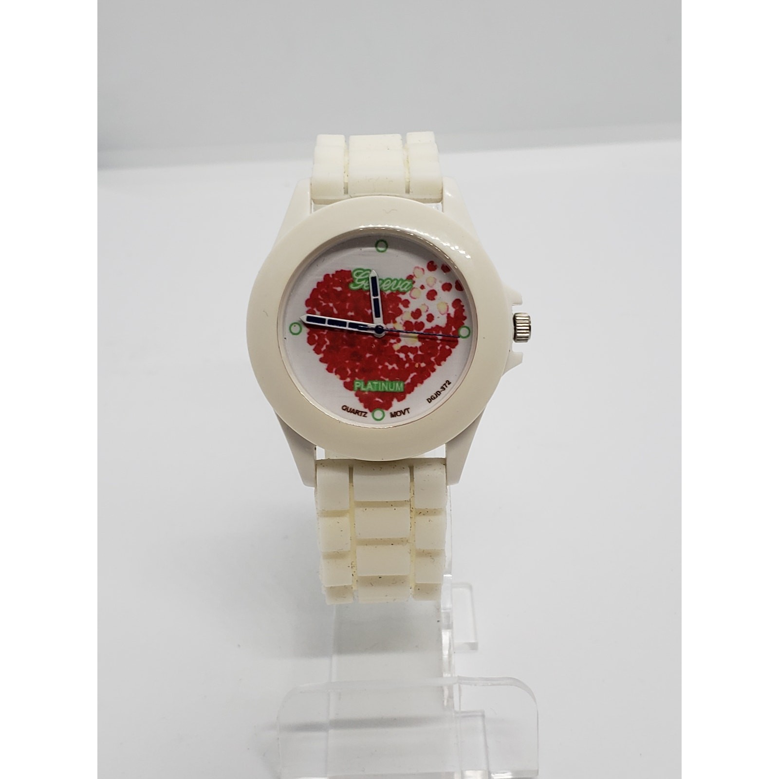 Geneva Platinum women’s watch. Water colored red heart on face. Working watch